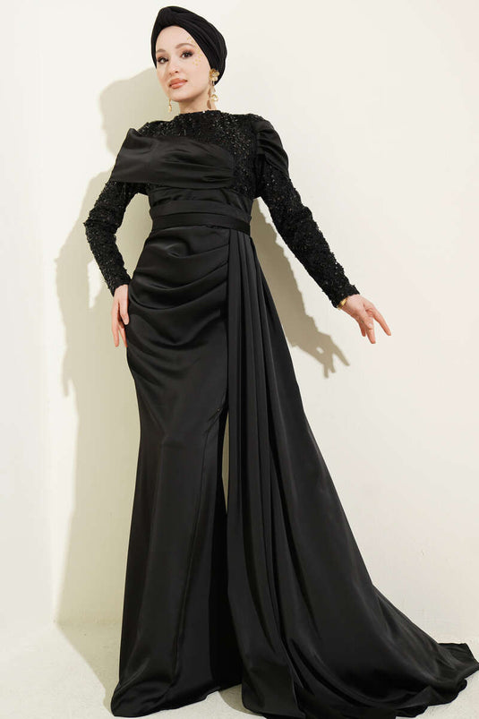 Abito da sera nero con coda e dettagli in paillettes
