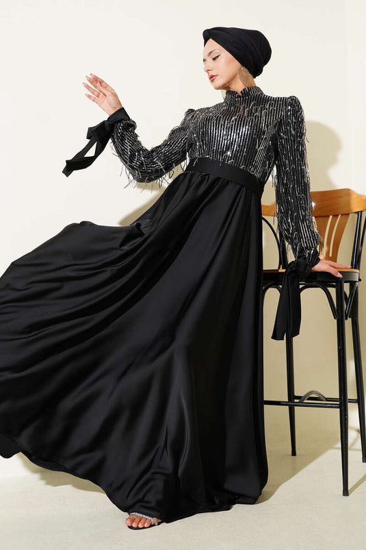 Abendkleid mit Pailletten und gebundenen Ärmeln in Schwarz und Silber