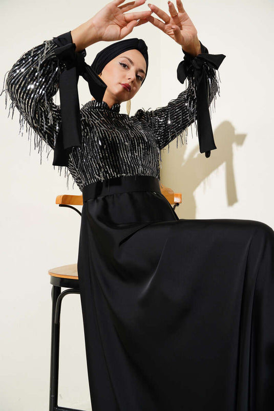 Abendkleid mit Pailletten und gebundenen Ärmeln in Schwarz und Silber