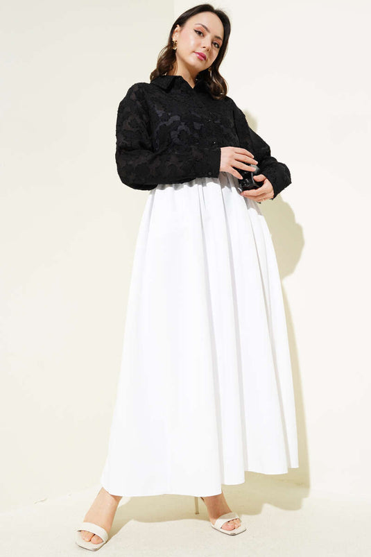 Chemise transparente noire à motif floral avec franges