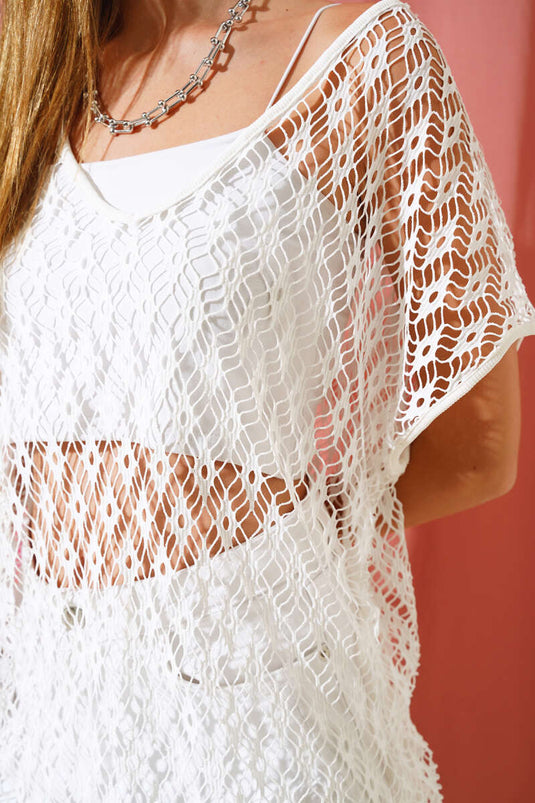 Pareo met kwastjes en gaas in het wit