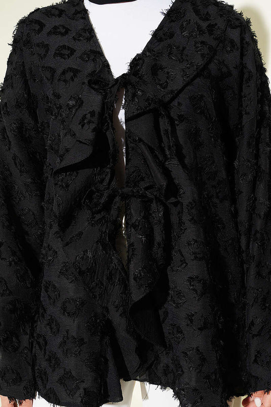 Kimono noir à pompons et volants avec lien en corde
