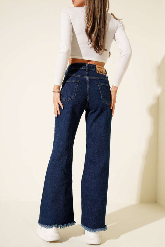 Jean en denim bleu à ourlet à franges