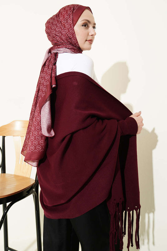 Poncho in maglia con frange bordeaux