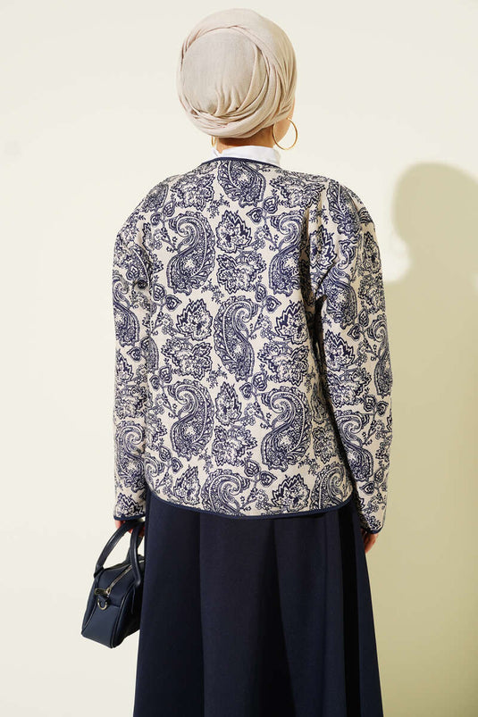 Veste courte matelassée beige à motif rétro