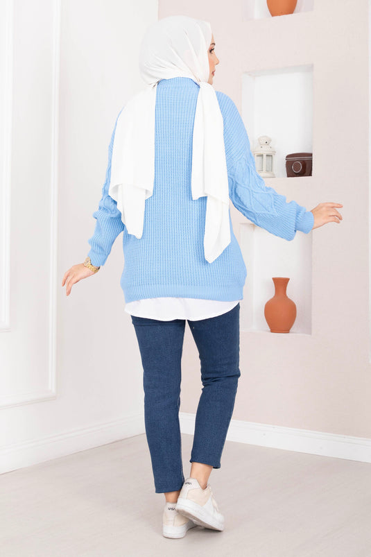 Pull en tricot à motif tressé bleu bébé