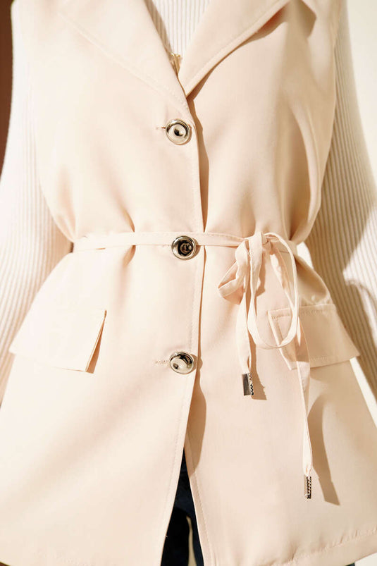 Gilet con tasche finte e cintura a corda crema