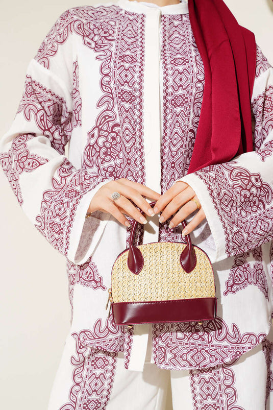 Loose-fitting patterned two-piece set in burgundy.