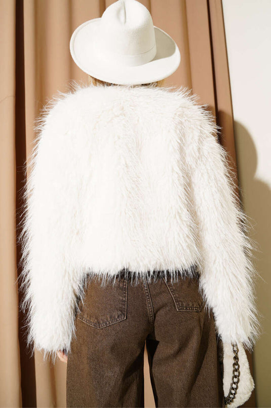 Loose-fitting, short fur coat, ecru.