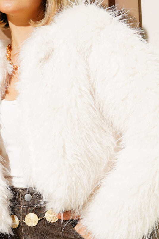 Loose-fitting, short fur coat, ecru.