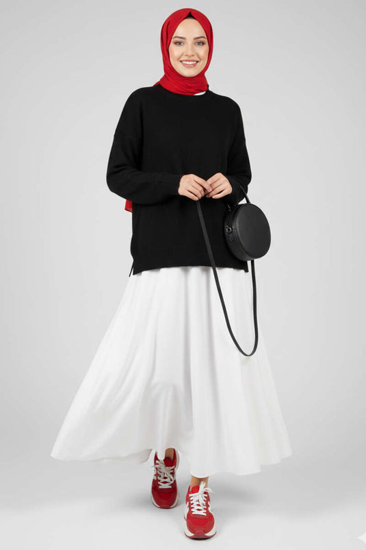 Pull ample en maille duveteuse, noir.