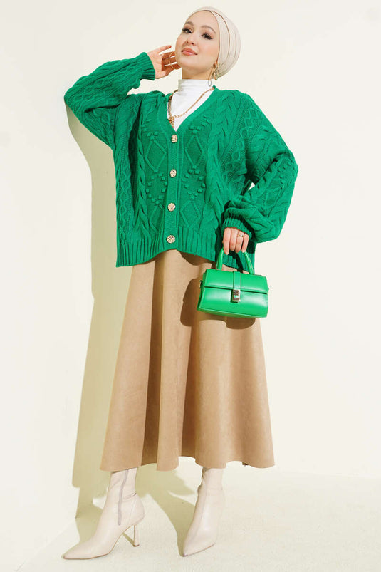 Kort gebreid vest met spiraalpatroon en knoopjes, groen