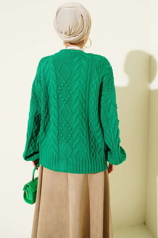 Kort gebreid vest met spiraalpatroon en knoopjes, groen