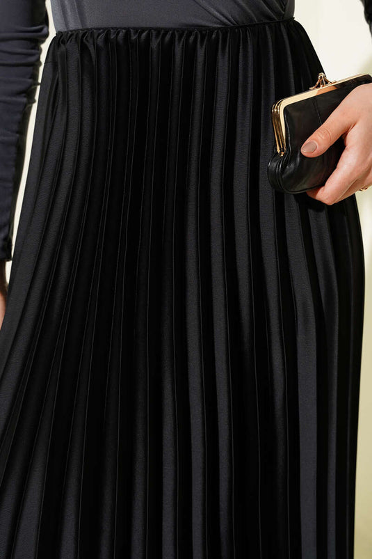 Gonna plissettata con aspetto satinato nera