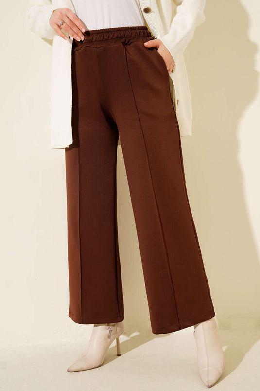 بنطال واسع الساق مع كشكش سكوبا بني