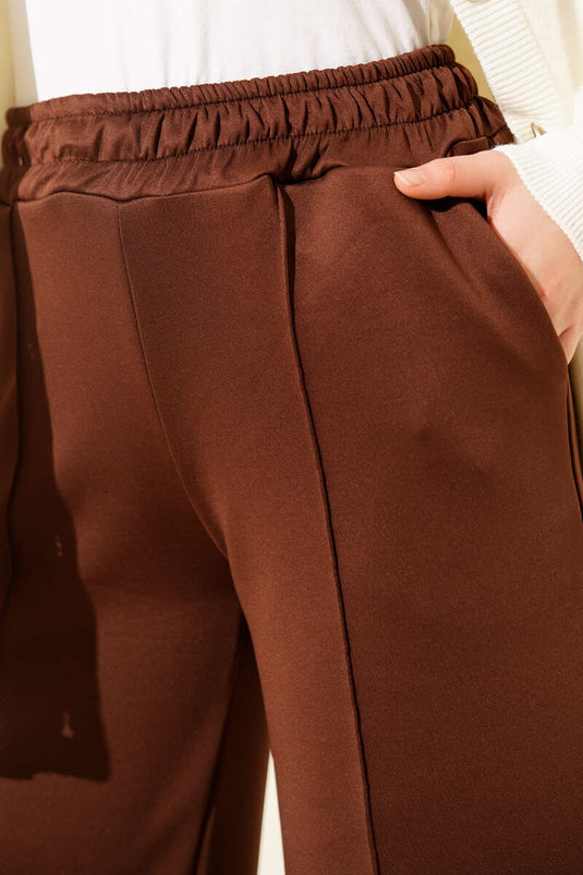 بنطال واسع الساق مع كشكش سكوبا بني