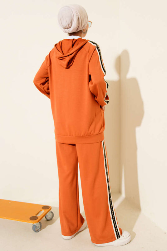 Ensemble deux pièces orange à capuche et rayures