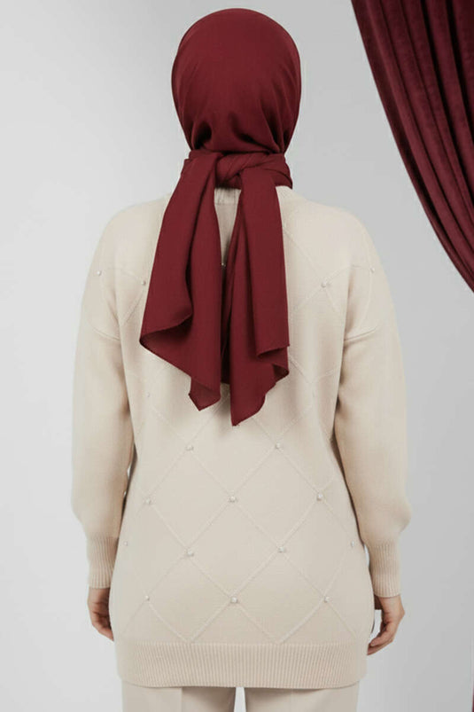 Tunique tricotée ornée de pierres