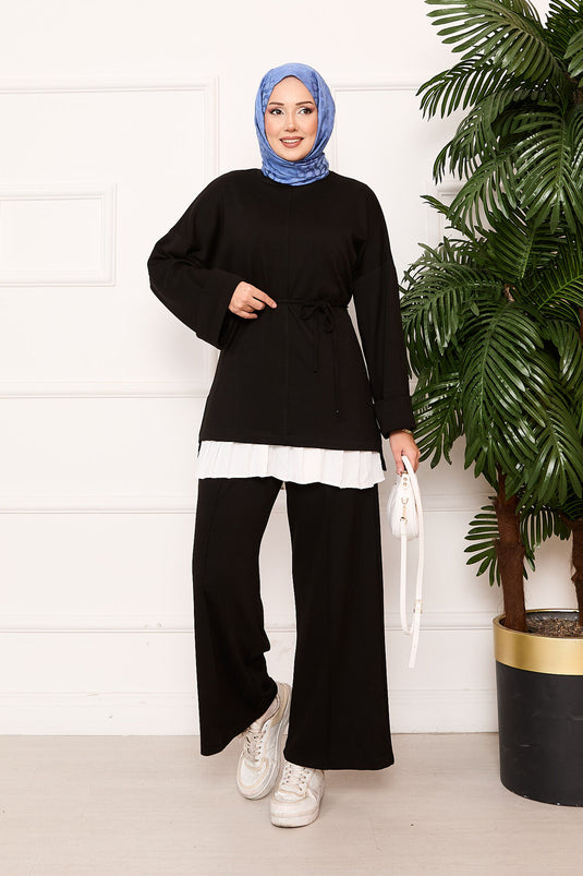 طقم أويشو أسود بتفاصيل طي الأكمام وحزام سييار