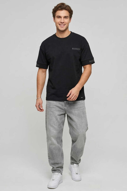 T-shirt oversize homme noir avec inscription dans le dos