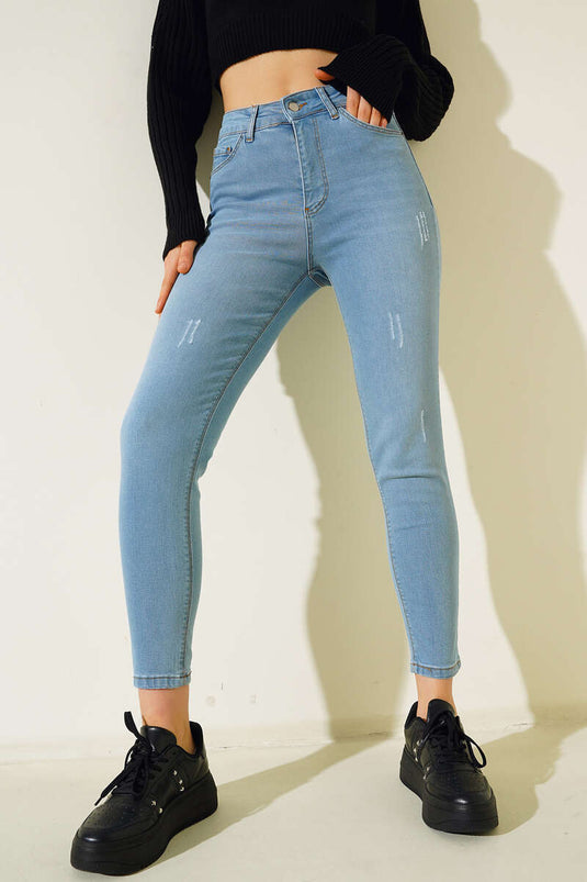 Sökük Detaylı Dar Paça Kot Pantolon Açık Mavi