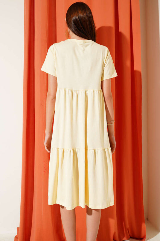 Robe beige à col V en jersey simple