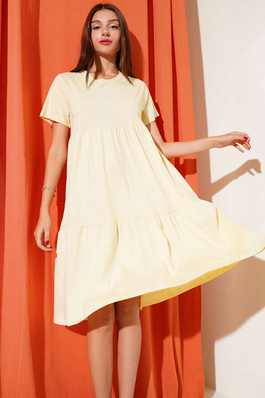 Robe beige à col V en jersey simple