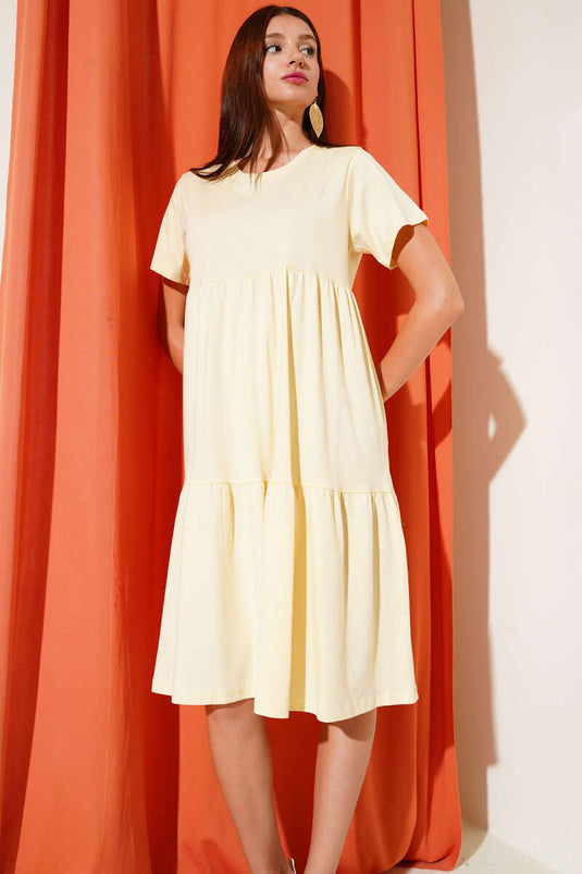 Robe beige à col V en jersey simple