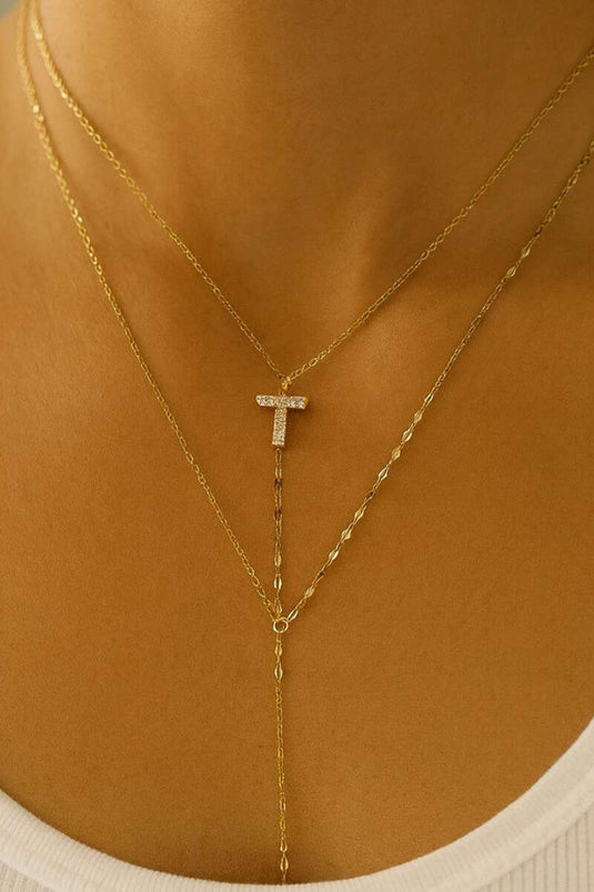 قلادة ذهبية بسلسلة مزينة بحرف T