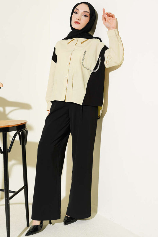 Camicia beige con dettagli in pietra e rifiniture