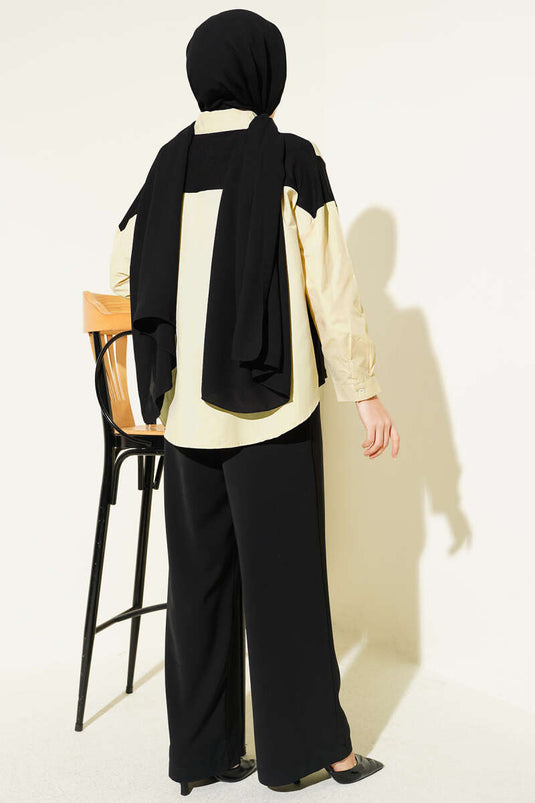 Camicia beige con dettagli in pietra e rifiniture
