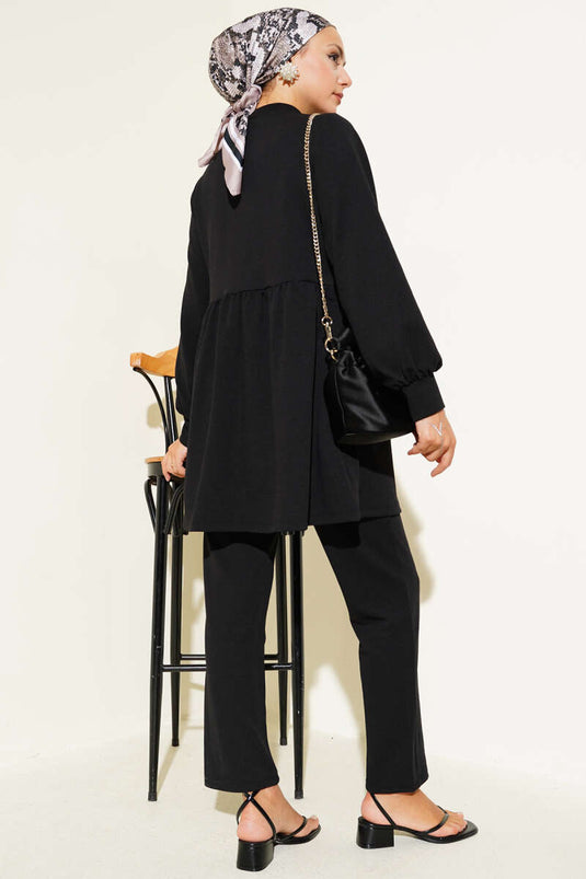 Costume deux pièces noir avec boutons en pierre