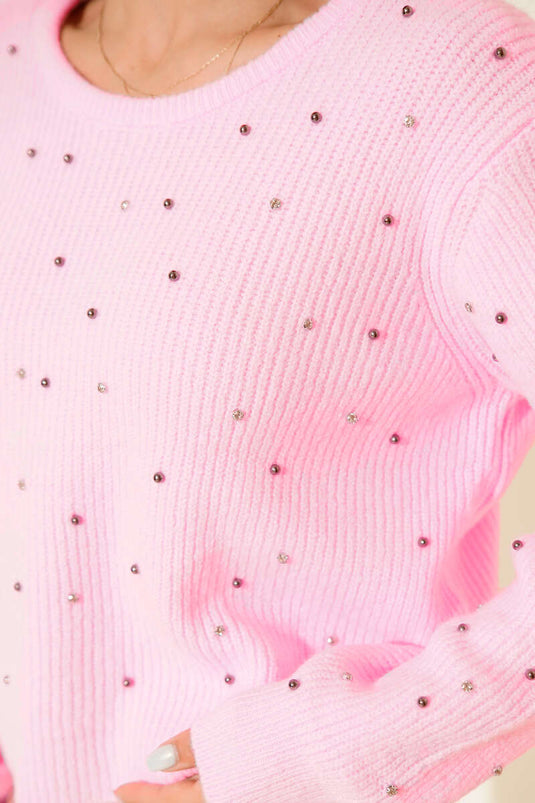 كنزة صوفية وردية اللون بدون ظهر مزينة بأحجار