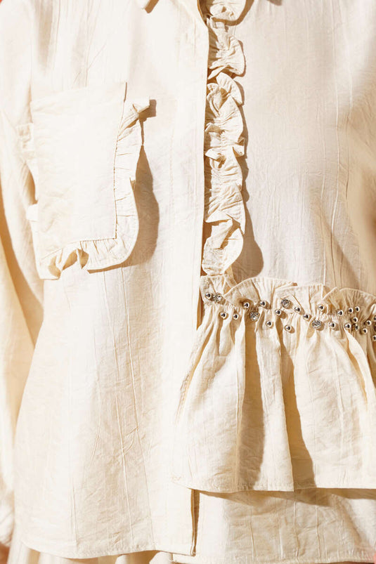 Ensemble deux pièces à volants et jupe beige