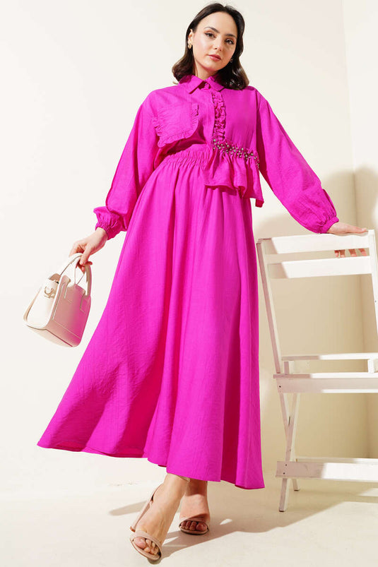 Costume deux pièces à volants et jupe à lanières fuchsia