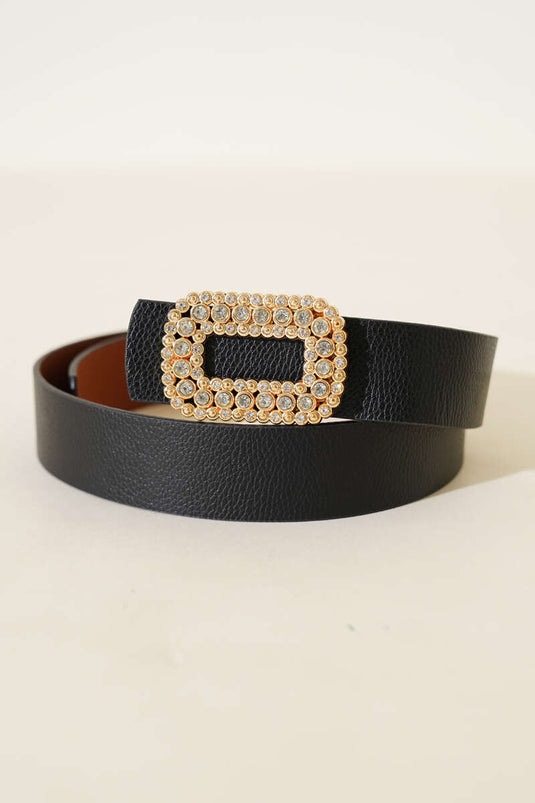 Ceinture noire avec boucle dorée ornée de pierres