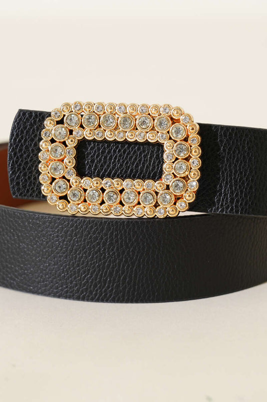 Ceinture noire avec boucle dorée ornée de pierres