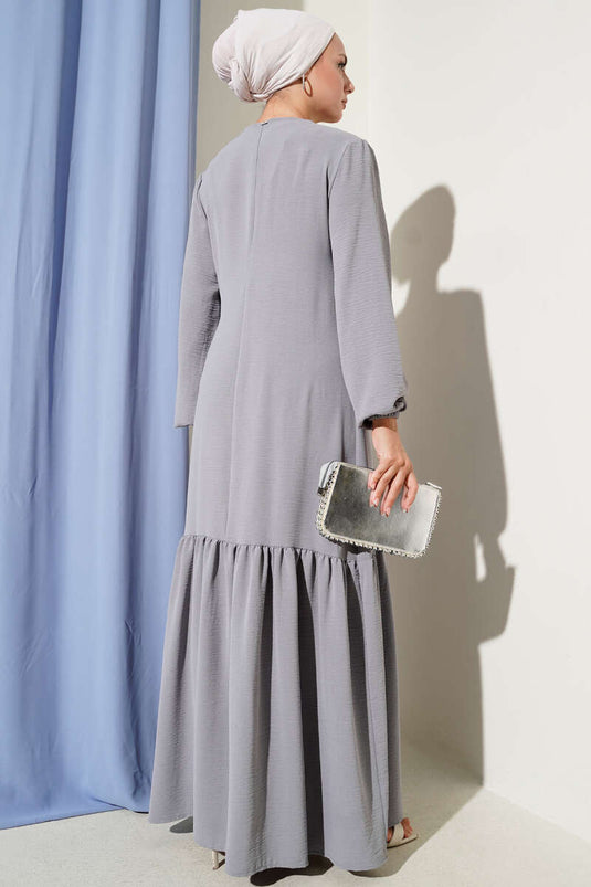 فستان مربوط بتفاصيل عين الطائر باللون الرمادي