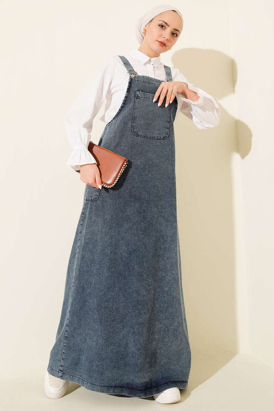 فستان دنيم بحمالات وجيب واحد باللون الأزرق الفاتح