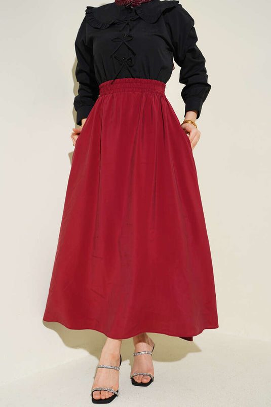 Gonna svasata con tasche in tensel bordeaux