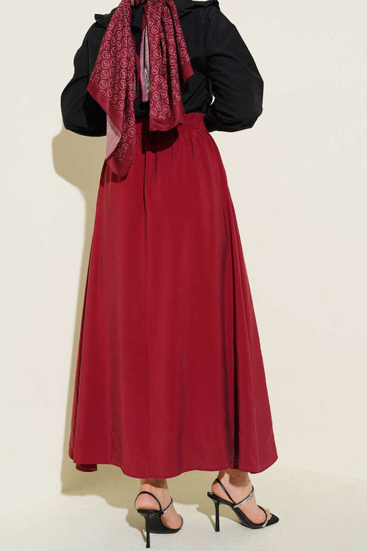 Gonna svasata con tasche in tensel bordeaux