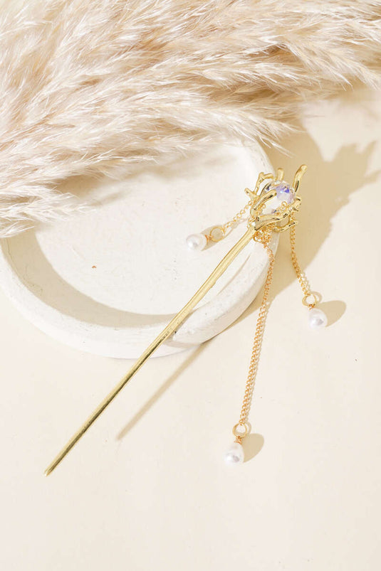 Stylo à bouton doré