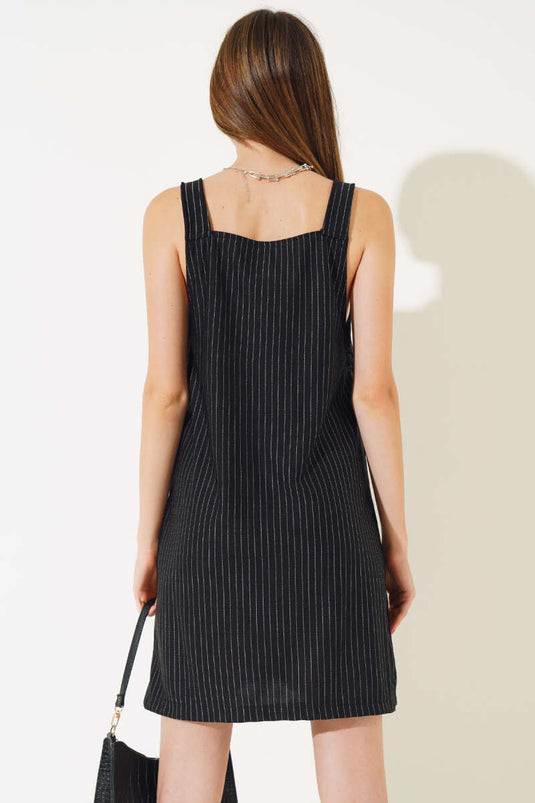 Salopette rayée noire avec poches