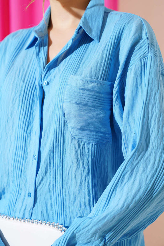 Chemise décontractée bleue à rayures transparentes et poches