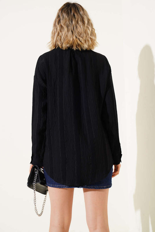 Chemise décontractée noire à rayures transparentes et poches