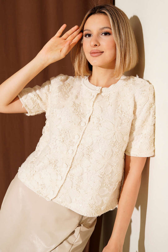 Cárdigan corto de punto con botones y flores de tul, beige