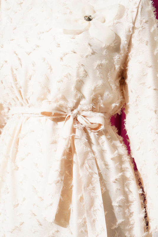 Tule gedetailleerde baard uitlopende jurk beige