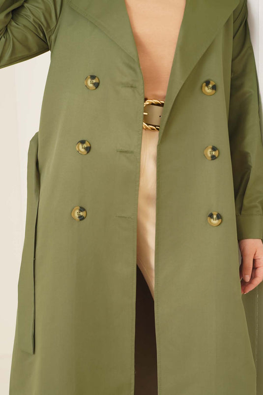 معطف واق من المطر باللون الأخضر الباستيل ذو ثلاثة أزرار مزدوجة الصدر