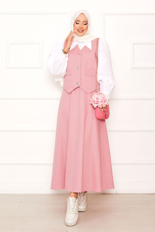 Costume deux pièces rose avec gilet et jupe à trois boutons