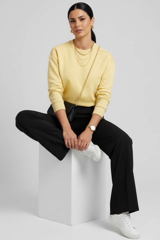 سويت شيرت أصفر أساسي بأكمام منسدلة بثلاثة خيوط